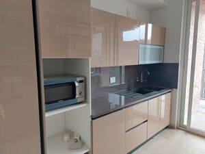Kitchen in 4 BHK Apartment at Emaar Orange Castle, Gomti Nagar – for Rent