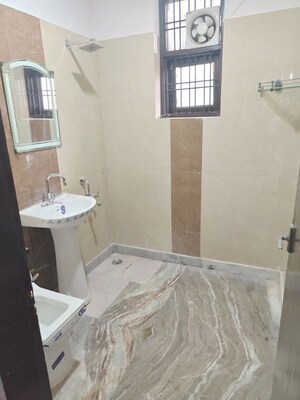 Bathroom in 4 BHK Builder Floor at Green Fields Colony – for Rent