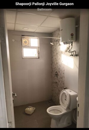 Bathroom in 2 BHK Apartment at Shapoorji Pallonji Joyville Gurgaon, Sector 102 – for Rent