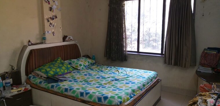 Bedroom, prasad-apartment-dahanukar-colony 1 Bedroom 543 Sq.Ft. Apartment In Kothrud Pune 10379431