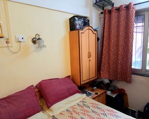 Bedroom in 3 BHK Apartment at Lalani Valentine Apartment, Malad East – for Rent