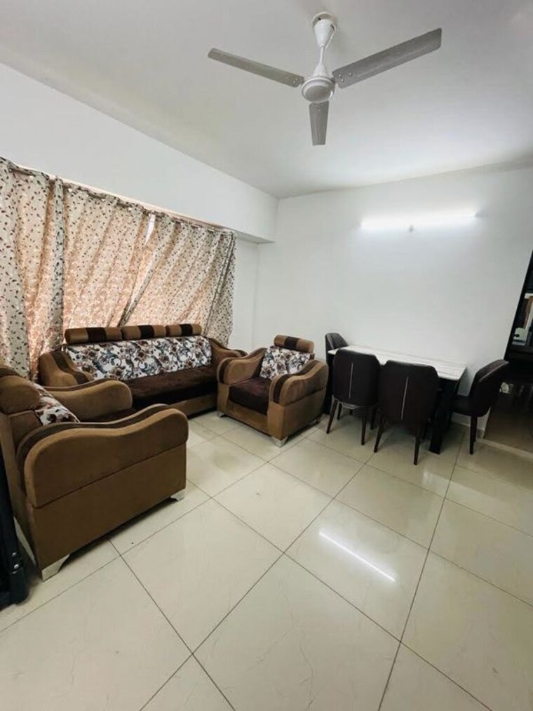 Living Room, amanora-victory-towers 2 Bedroom 750 Sq.Ft. Apartment In Hadapsar Pune 10379517