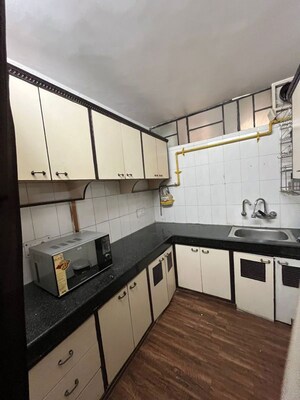 Kitchen in 2 BHK Apartment at Janakpuri – for Rent