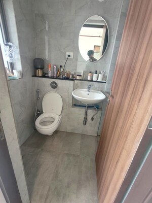 Bathroom in 2 BHK Apartment at Sheth Auris Bliss, Malad West – for Rent