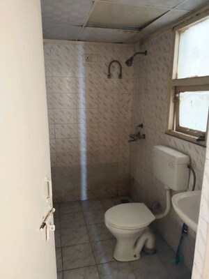 Bathroom in 2 BHK Apartment at Adore Happy Homes, Sector 86 – for Sale