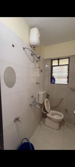 Bathroom in 2 BHK Apartment at Mhada Colony – for Rent