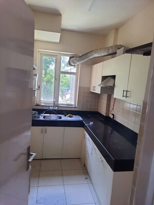 Kitchen in 2 BHK Apartment at Mahindra Aura, Sector 110a – for Sale