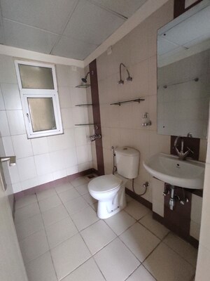 Bathroom in 2.5 BHK Apartment at Mahindra Aura, Sector 110a – for Rent