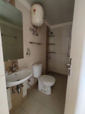 Bathroom in 2.5 BHK Apartment at Mahindra Aura, Sector 110a – for Rent