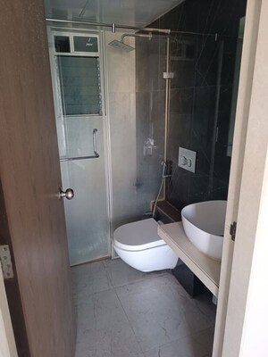 Bathroom in 1.5 BHK Apartment at Dosti West County, Balkum Pada – for Rent