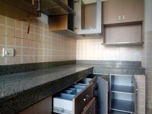 Kitchen in 2.5 BHK Apartment at Mahindra Aura, Sector 110a – for Rent
