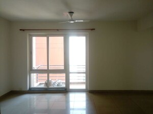 Room in 2.5 BHK Apartment at Mahindra Aura, Sector 110a – for Rent