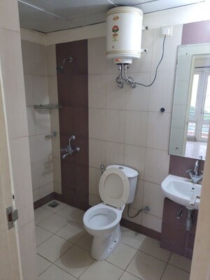 Bathroom in 3 BHK Apartment at Mahindra Aura, Sector 110a – for Rent