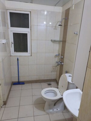 Bathroom in 3 BHK Apartment at Mahindra Aura, Sector 110a – for Rent