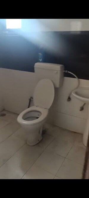Bathroom in 2 BHK Apartment at High End Paradise II, Raj Nagar Extension – for Rent