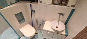 Bathroom in 3 BHK Apartment at Lakshachandi Heights, Goregaon East – for Rent