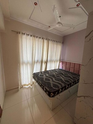 Bedroom in 3 BHK Apartment at Magarpatta City Roystonea, Hadapsar – for Rent