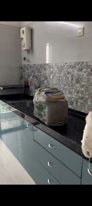 Kitchen in 2 BHK Apartment at Regency Anantam Phase 2, Dombivli East – for Rent