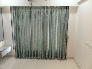 Living Room in 2 BHK Apartment at Gurukrupa Marina Enclave, Malad West – for Rent