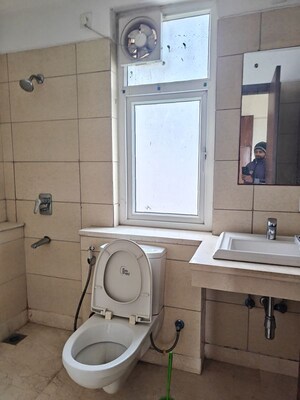 Bathroom in 3 BHK Apartment at Puri Diplomatic Greens Phase I, Sector 111 – for Rent