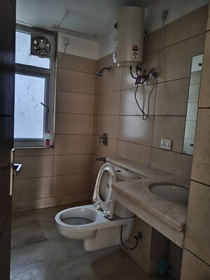 Bathroom in 3 BHK Apartment at Puri Diplomatic Greens Phase I, Sector 111 – for Rent