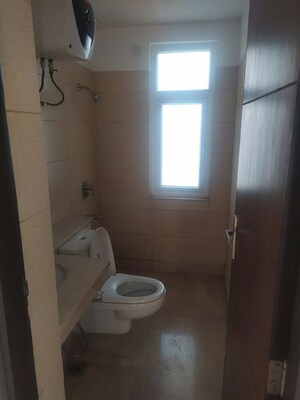 Bathroom in 3 BHK Apartment at Puri Diplomatic Greens Phase I, Sector 111 – for Sale
