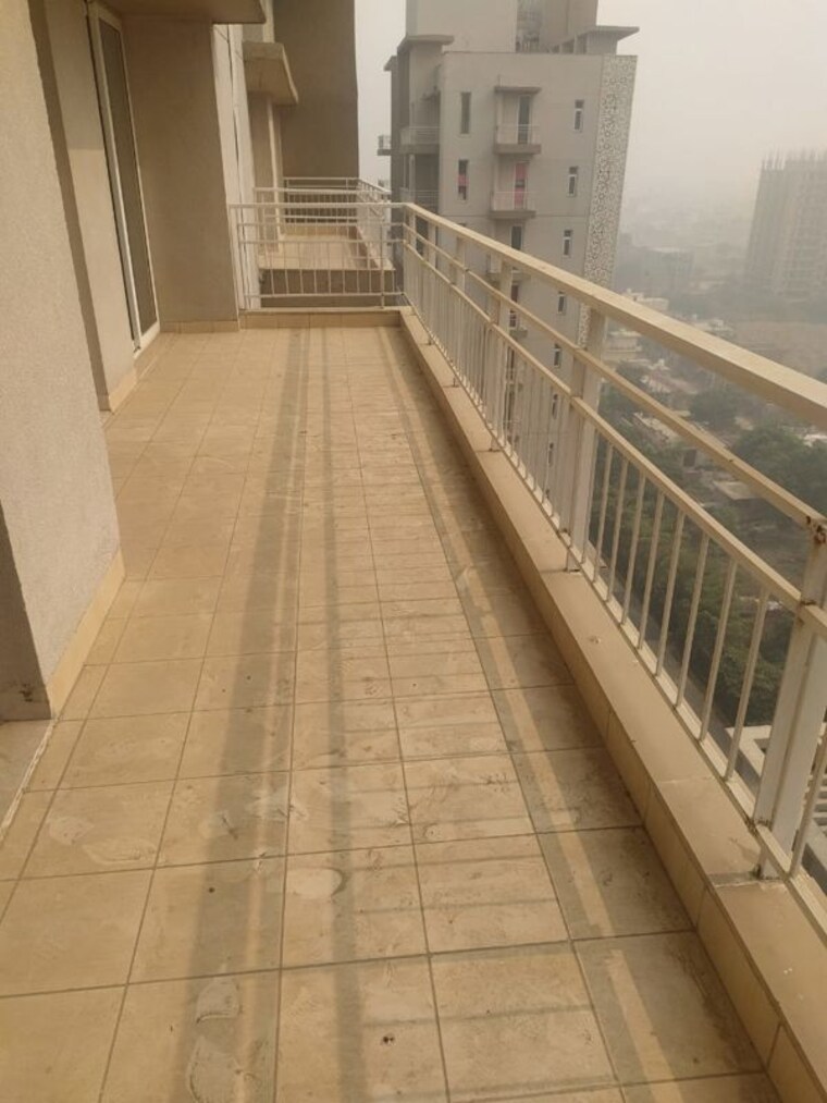 Balcony, puri-diplomatic-greens-phase-i 3 Bedroom 1780 Sq.Ft. Apartment In Sector 111 Gurgaon 10380188