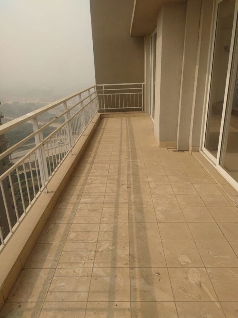 Balcony, puri-diplomatic-greens-phase-i 3 Bedroom 1780 Sq.Ft. Apartment In Sector 111 Gurgaon 10380188
