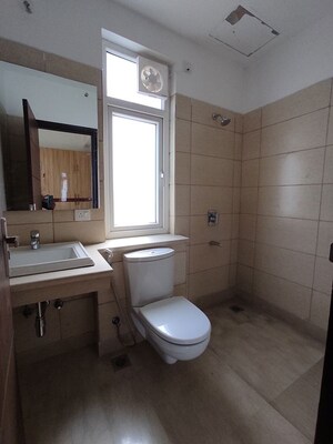 Bathroom in 3.5 BHK Apartment at Puri Diplomatic Greens Phase I, Sector 111 – for Rent