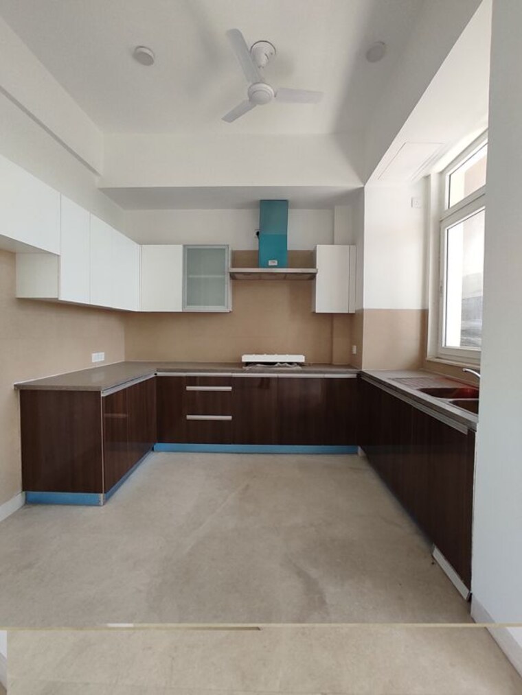 Kitchen, puri-diplomatic-greens-phase-i 3.5 Bedroom 2200 Sq.Ft. Apartment In Sector 111 Gurgaon 10380199