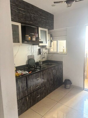 Kitchen in 2 BHK Apartment at Anand Eastwoods, Viman Nagar – for Rent