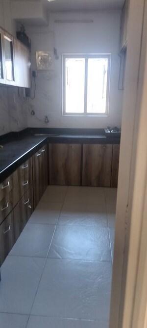 Kitchen in 2 BHK Apartment at Silver Arch Apartments, Andheri West – for Rent