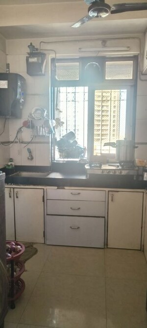 Kitchen in 2 BHK Apartment at Dosti Acres Aster, Wadala East – for Rent