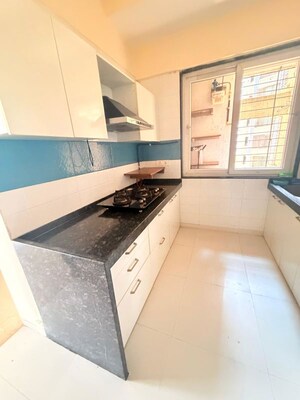 Kitchen in 3 BHK Apartment at Concret Sai Saakshaat, Kharghar – for Rent