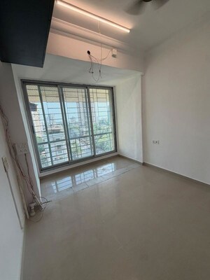 Room in 2.5 BHK Apartment at Lotus Sky Garden, Malad West – for Rent