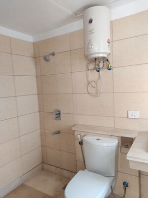 Bathroom in 4 BHK Apartment at Puri Diplomatic Greens Phase I, Sector 111 – for Rent