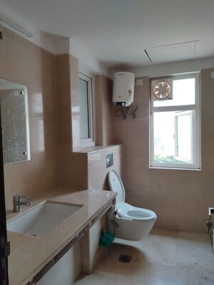 Bathroom in 4 BHK Apartment at Puri Diplomatic Greens Phase I, Sector 111 – for Rent