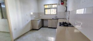 Kitchen in 3 BHK Apartment at Hiranandani Estate Rodas Enclave, Ghodbunder Road – for Rent