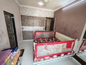 Bedroom in 2 BHK Apartment at Aditya Urvashi, Borivali West – for Sale
