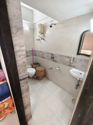 Bathroom in 2 BHK Apartment at Aditya Urvashi, Borivali West – for Sale