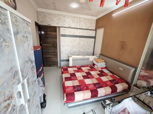 Bedroom in 2 BHK Apartment at Aditya Urvashi, Borivali West – for Sale