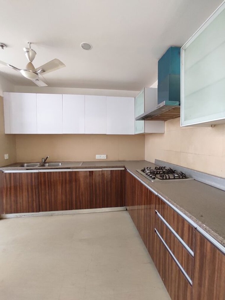 Kitchen, puri-diplomatic-greens-phase-i 4 Bedroom 2950 Sq.Ft. Apartment In Sector 111 Gurgaon 10380301