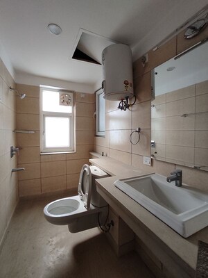 Bathroom in 4 BHK Apartment at Puri Diplomatic Greens Phase I, Sector 111 – for Sale
