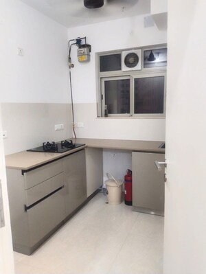 Kitchen in 1 BHK Apartment at Hiranandani Estate Solitaire C, Ghodbunder Road – for Rent