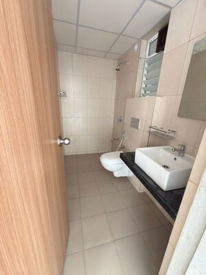 Bathroom in 3 BHK Apartment at Godrej Emerald, Ghodbunder Road – for Rent
