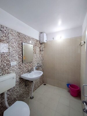 Bathroom in 3 BHK Apartment at Rishita Manhattan, Gomti Nagar – for Rent