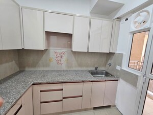 Kitchen in 2.5 BHK Apartment at Mahagun Mywoods II, Sector 16c Greater Noida – for Rent