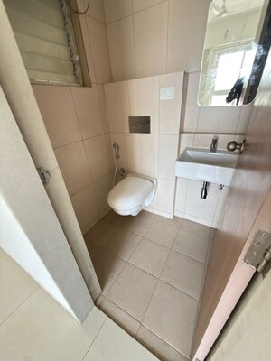 Bathroom in 3 BHK Apartment at Godrej Emerald, Ghodbunder Road – for Rent