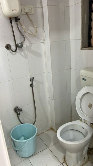 Bathroom in 2 BHK Apartment at Raunak Unnathi Woods Phase 4 And 5, Ghodbunder Road – for Rent