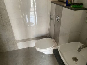 Bathroom in 3 BHK Apartment at Brahma Realty Skycity, Dhanori – for Rent